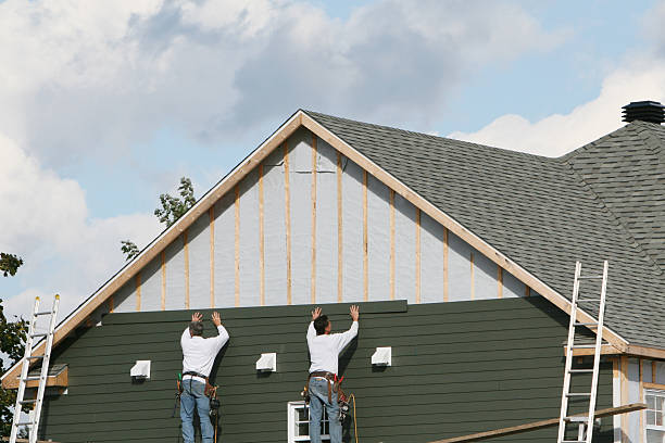 Professional Siding Contractor technician working in Four Oaks, NC